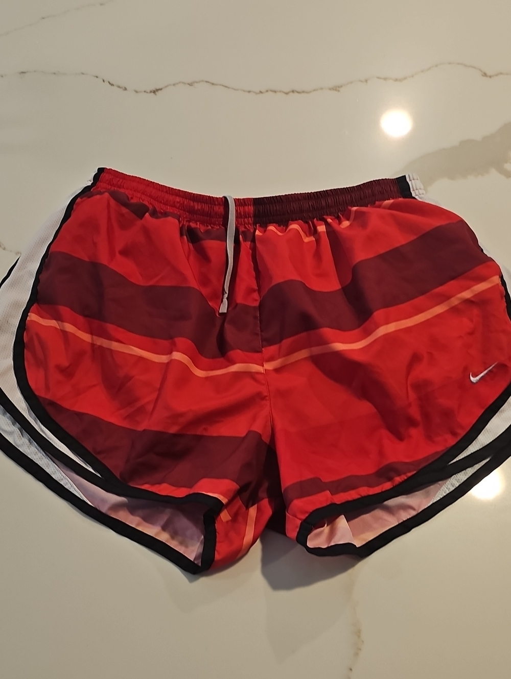 Nike Women’s Red and Maroon Striped Athletic Shorts